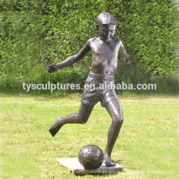 China factory supplied life size bronze young boy playing football models sculpture for garden decoration